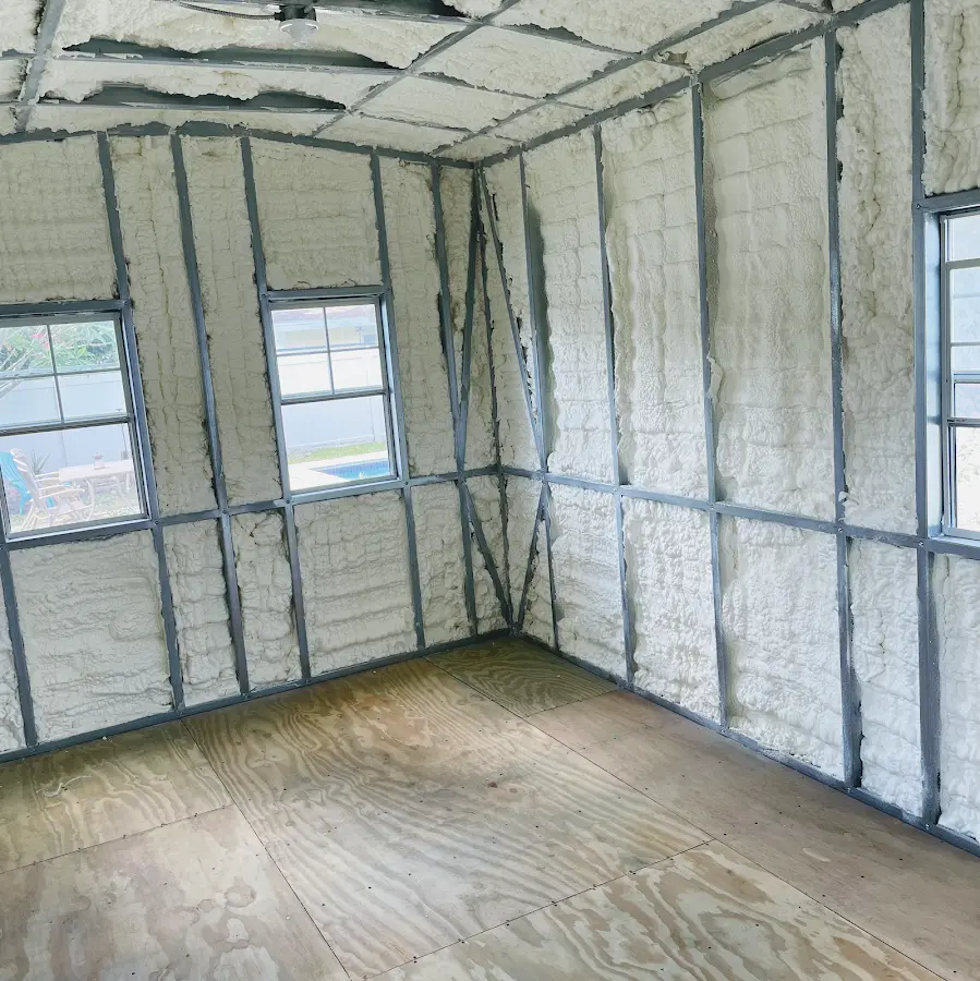 Closed-cell spray foam insulation applied to wall cavities in a residential project in Abington